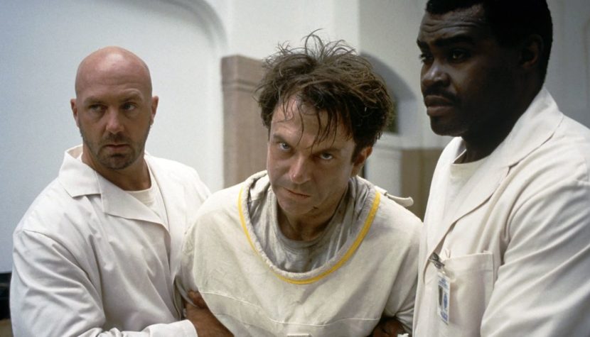 john carpenter In the Mouth of Madness sam neill straight jacket