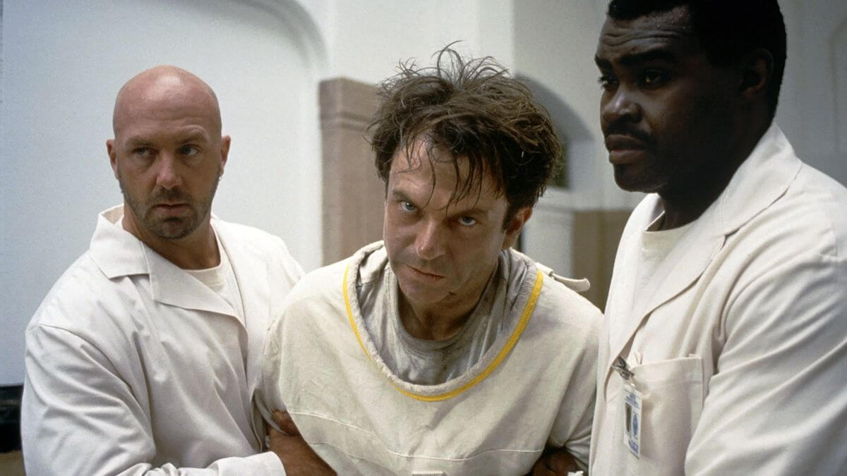 john carpenter In the Mouth of Madness sam neill straight jacket