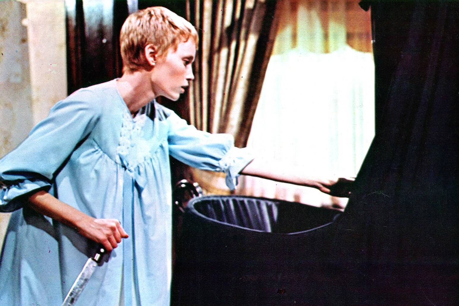 Rosemary's Baby mia farrow with a knife over the cradle