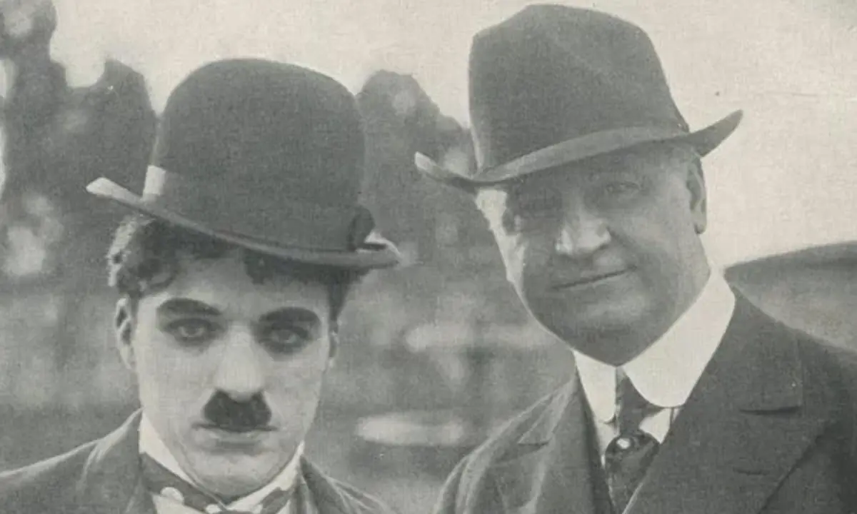 Charlie Chaplin and John R. Freuler