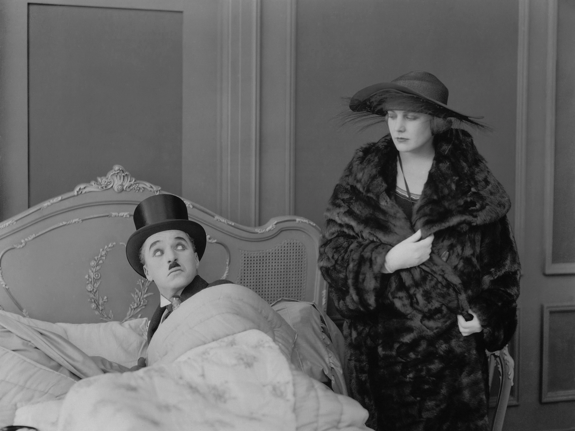 Charlie Chaplin and Edna Purviance in The Idle Class