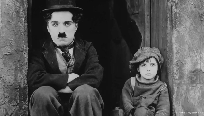 Charlie Chaplin and Jackie Coogan in The Kid