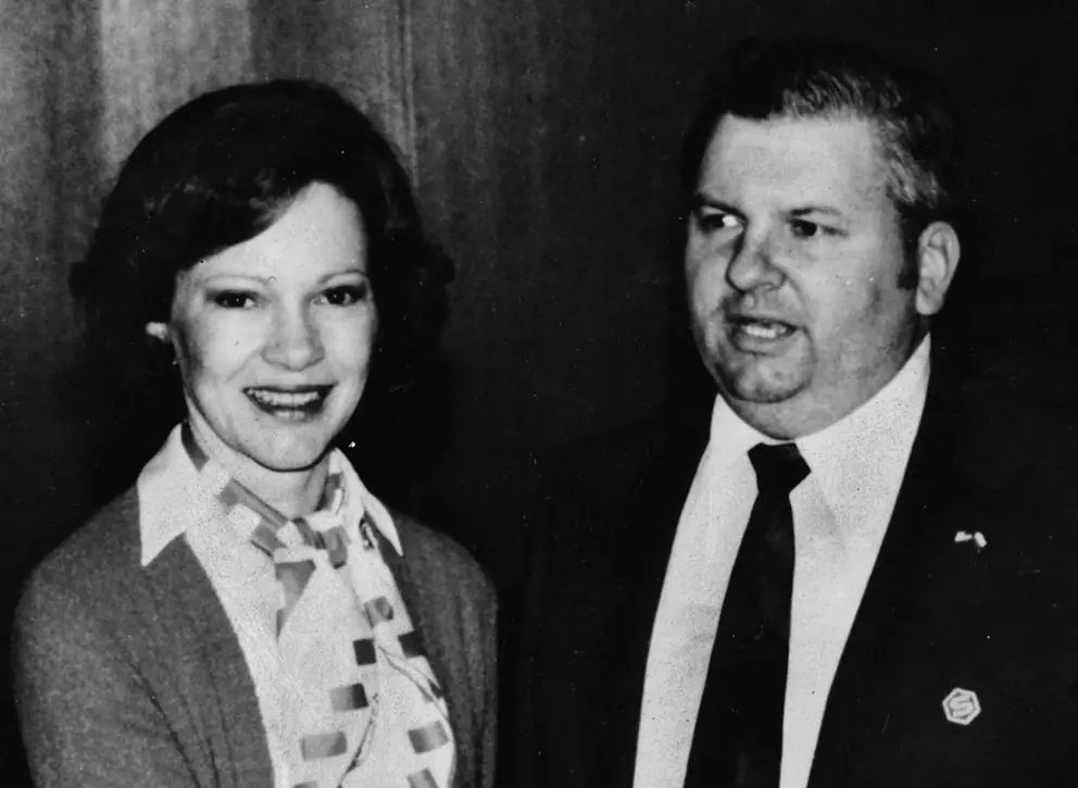 John Wayne Gacy poses with First Lady Roslynn Carter