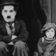 Charlie Chaplin and Jackie Coogan in The Kid